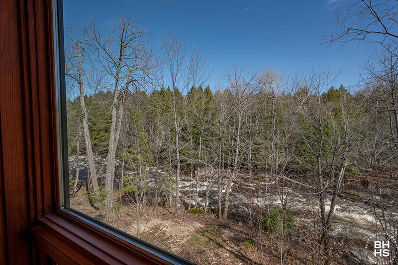 667 Days Mills Road St. Regis Falls, NY 12980 - Photo 9 of 51 HomeOnLakeOzoniaOutlet_LivingRoom_View