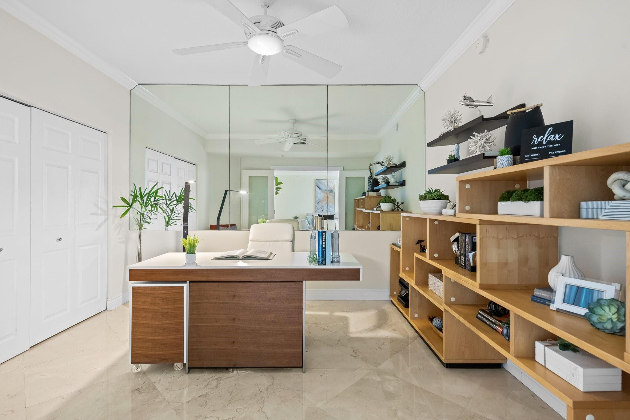 100 South Birch Road, Unit 2504 Fort Lauderdale, FL 33316 - Photo 21 of 42 a room with cabinets and a wooden floor