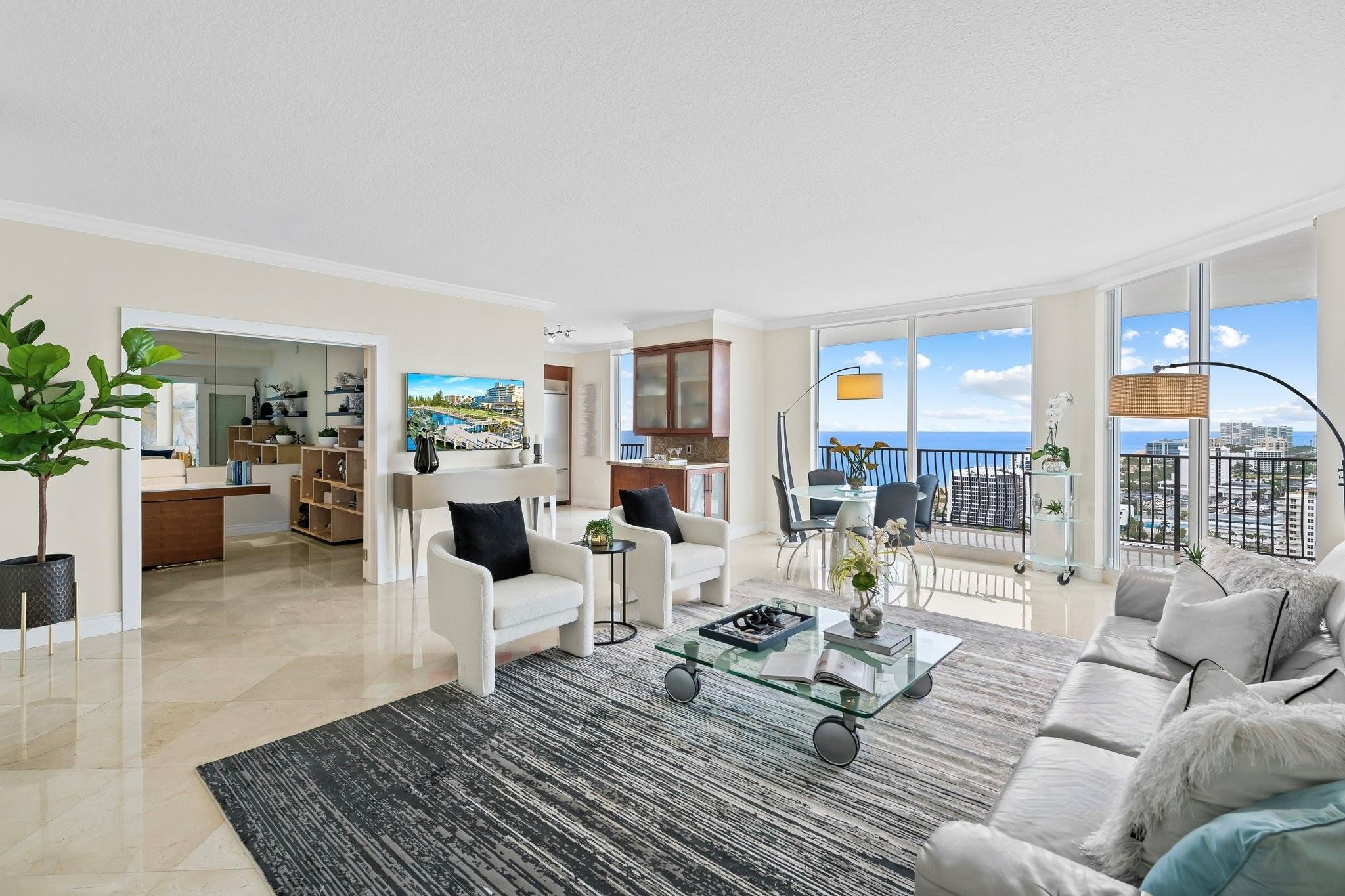 100 South Birch Road, Unit 2504 Fort Lauderdale, FL 33316 - Photo 7 of 42 a living room with furniture and a couch