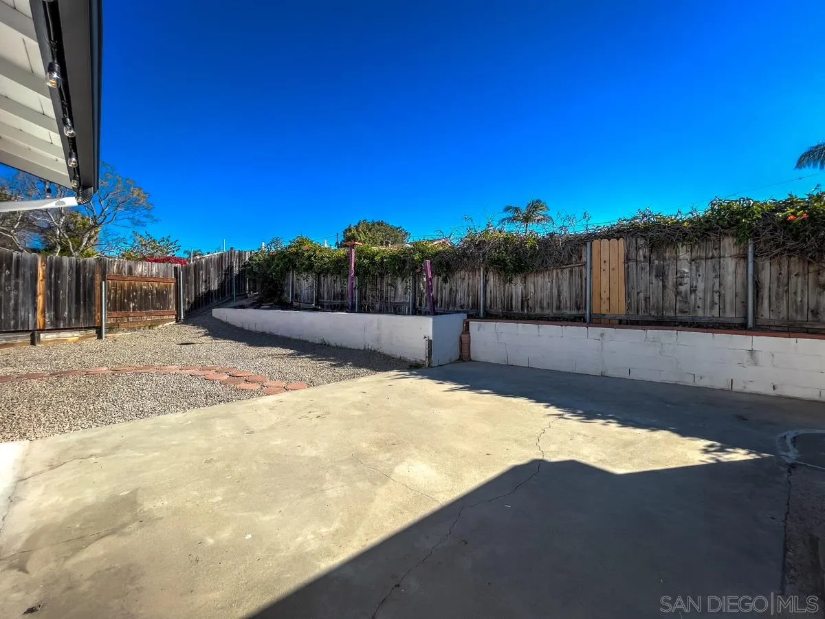 2922 Luana Drive Oceanside, CA 92056 - Photo 28 of 28 a view of backyard with swimming pool and trees in the background