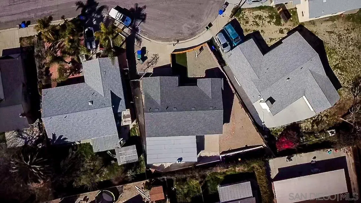 2922 Luana Drive Oceanside, CA 92056 - Photo 3 of 28 an aerial view of a house with a yard