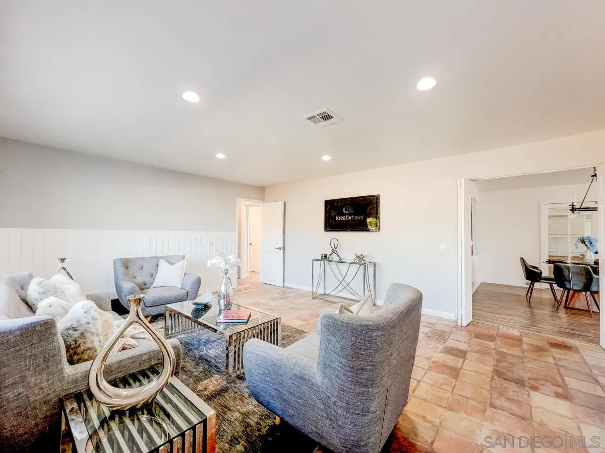 2922 Luana Drive Oceanside, CA 92056 - Photo 6 of 28 a living room with furniture and a flat screen tv