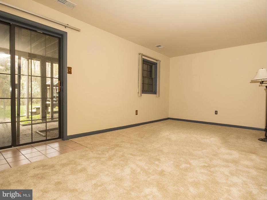 27 Rhodes Place Lutherville-Timonium, MD 21093 - Photo 15 of 19 a view of an empty room with a window