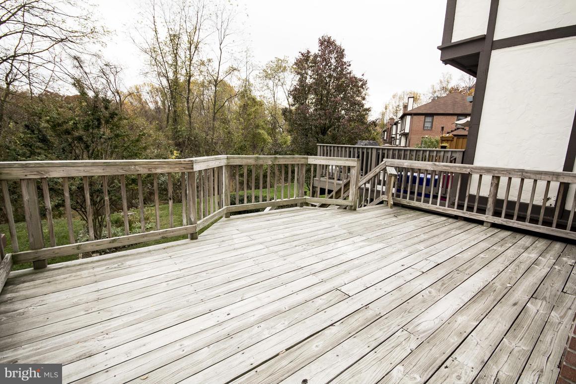 27 Rhodes Place Lutherville-Timonium, MD 21093 - Photo 18 of 19 a view of deck with wooden floor and fence