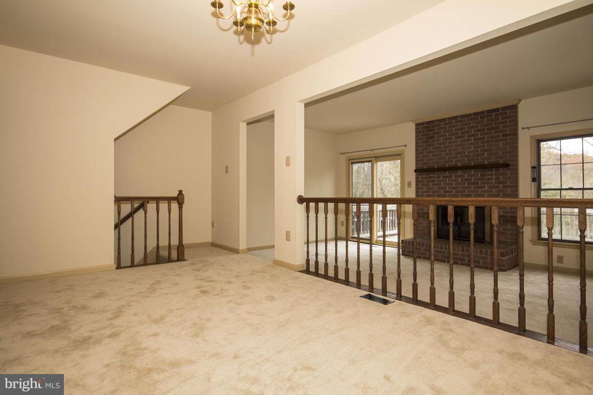 27 Rhodes Place Lutherville-Timonium, MD 21093 - Photo 5 of 19 a view of a livingroom with a balcony