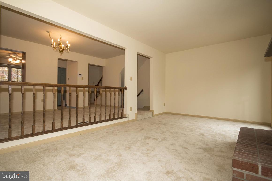 27 Rhodes Place Lutherville-Timonium, MD 21093 - Photo 7 of 19 a view of an empty room with stairs