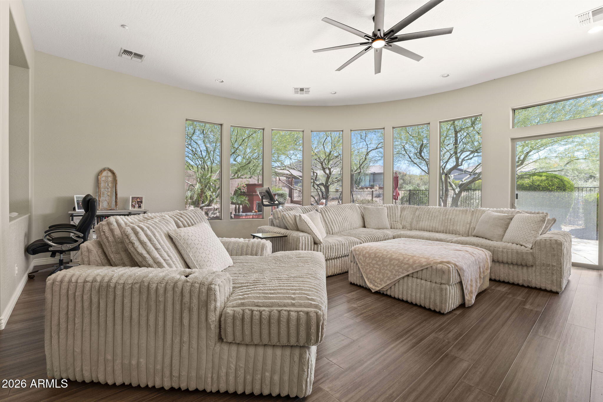 41619 North River Bend Road Anthem, AZ 85086 - Photo 41 of 84 a living room with furniture and a large window