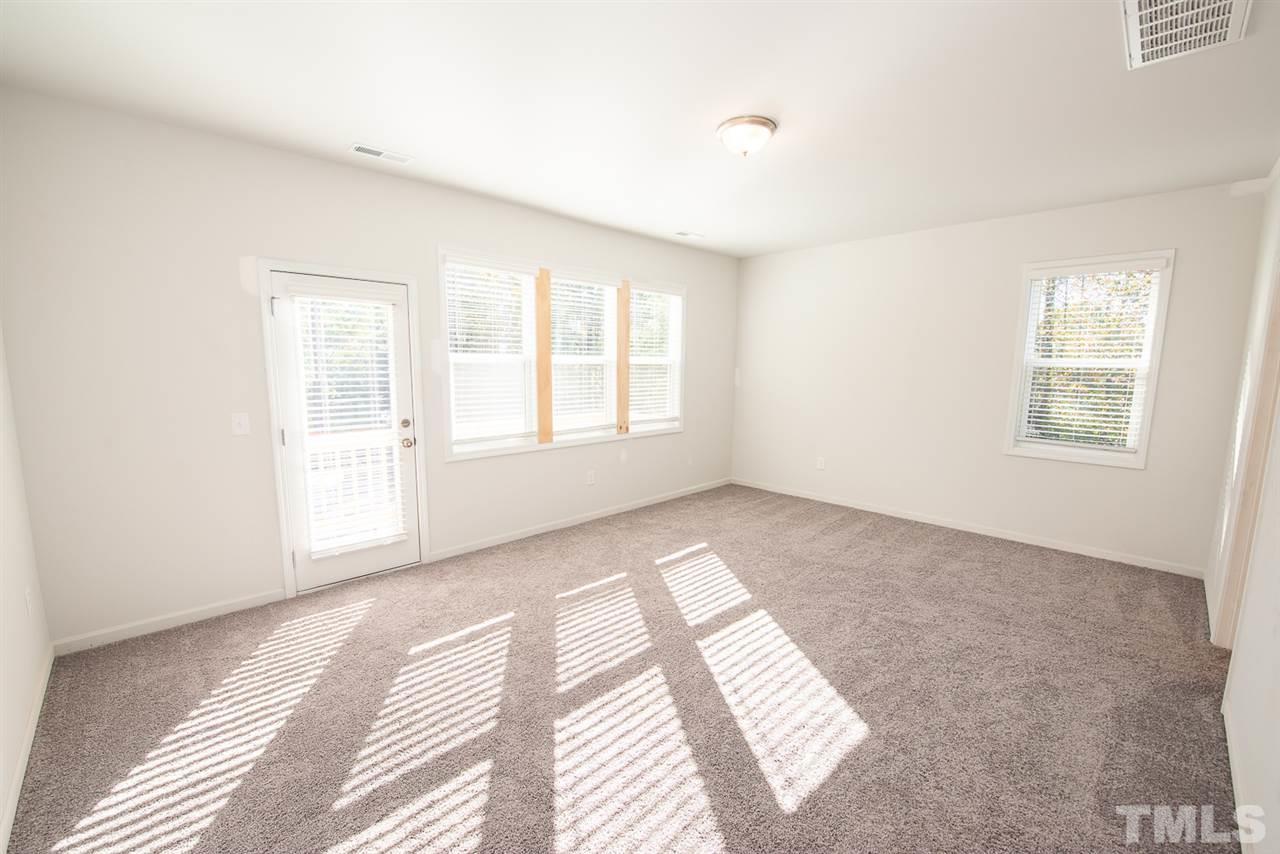 3620 Buffaloe Road, Unit 1 Raleigh, NC 27604 - Photo 11 of 25 a view of an empty room with a window