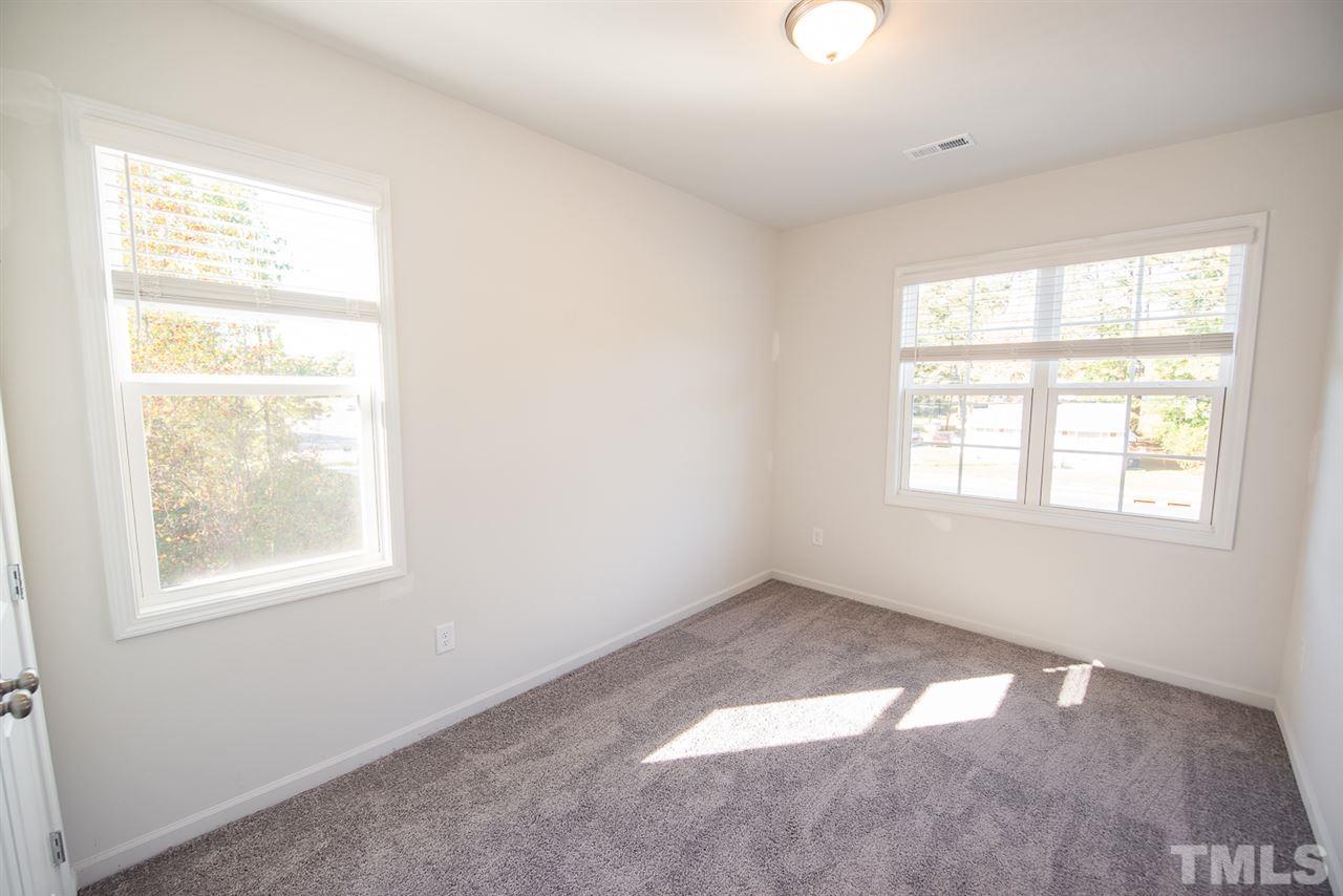 3620 Buffaloe Road, Unit 1 Raleigh, NC 27604 - Photo 15 of 25 an empty room with a window