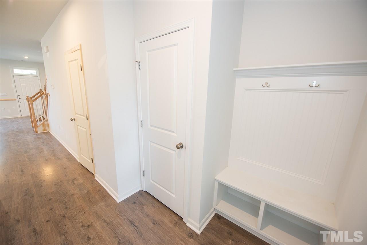 3620 Buffaloe Road, Unit 1 Raleigh, NC 27604 - Photo 8 of 25 a view of a hallway with wooden floor