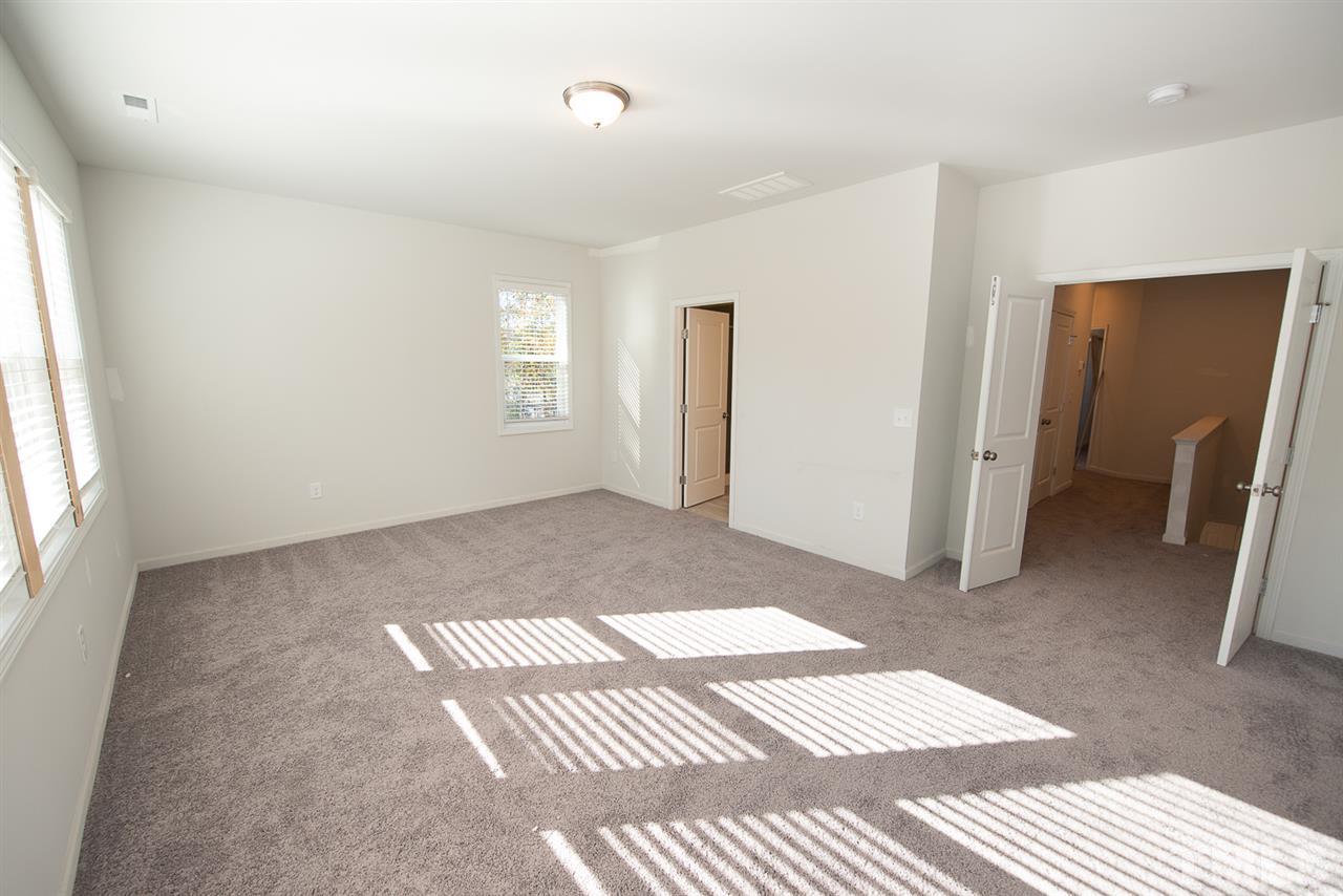 3620 Buffaloe Road, Unit 1 Raleigh, NC 27604 - Photo 10 of 25 a view of an empty room and window