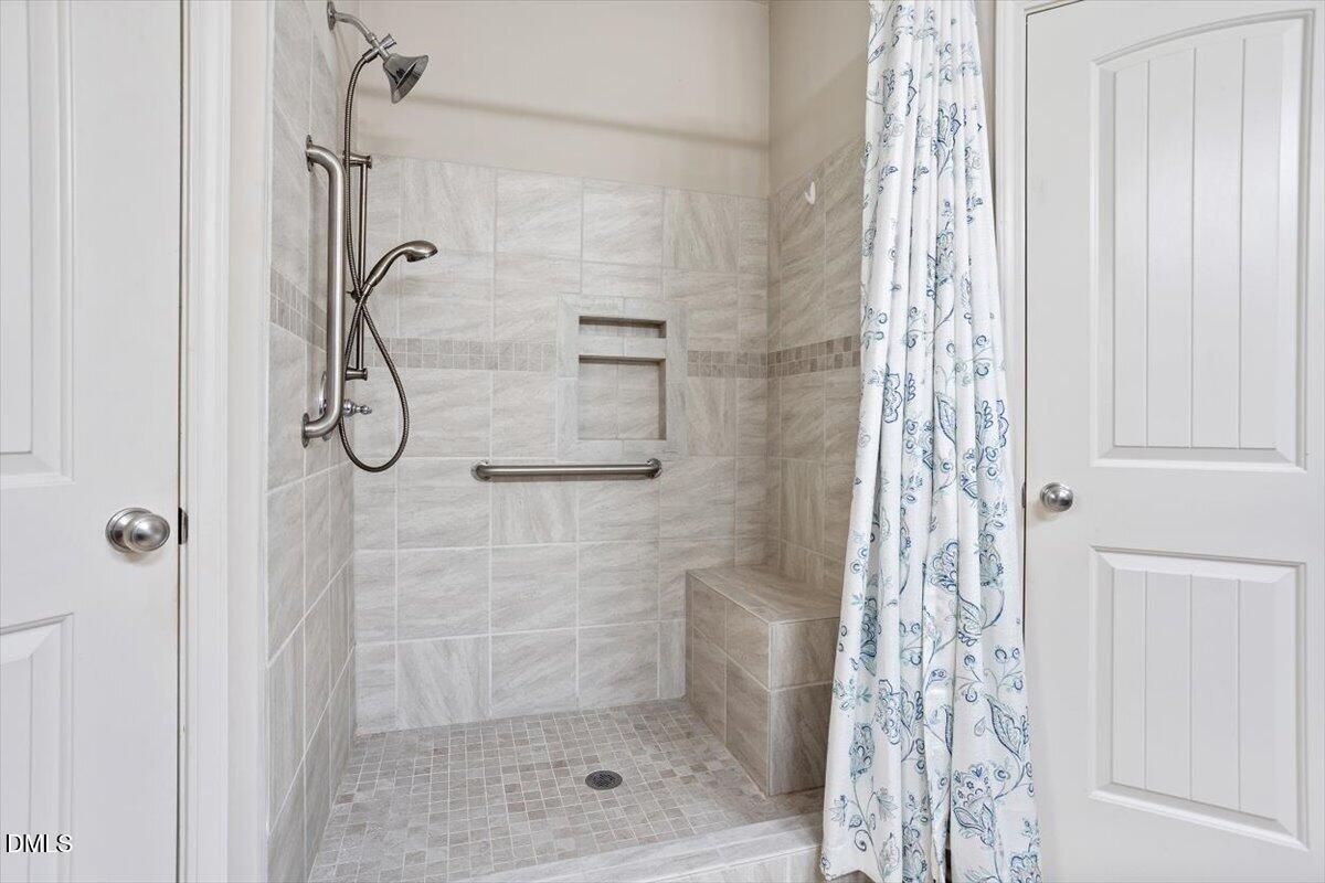 35 Fox Run Court Benson, NC 27504 - Photo 24 of 54 a bathroom with a shower
