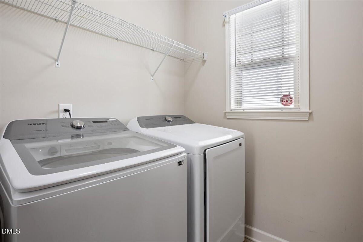 35 Fox Run Court Benson, NC 27504 - Photo 25 of 54 a utility room with dryer and washer