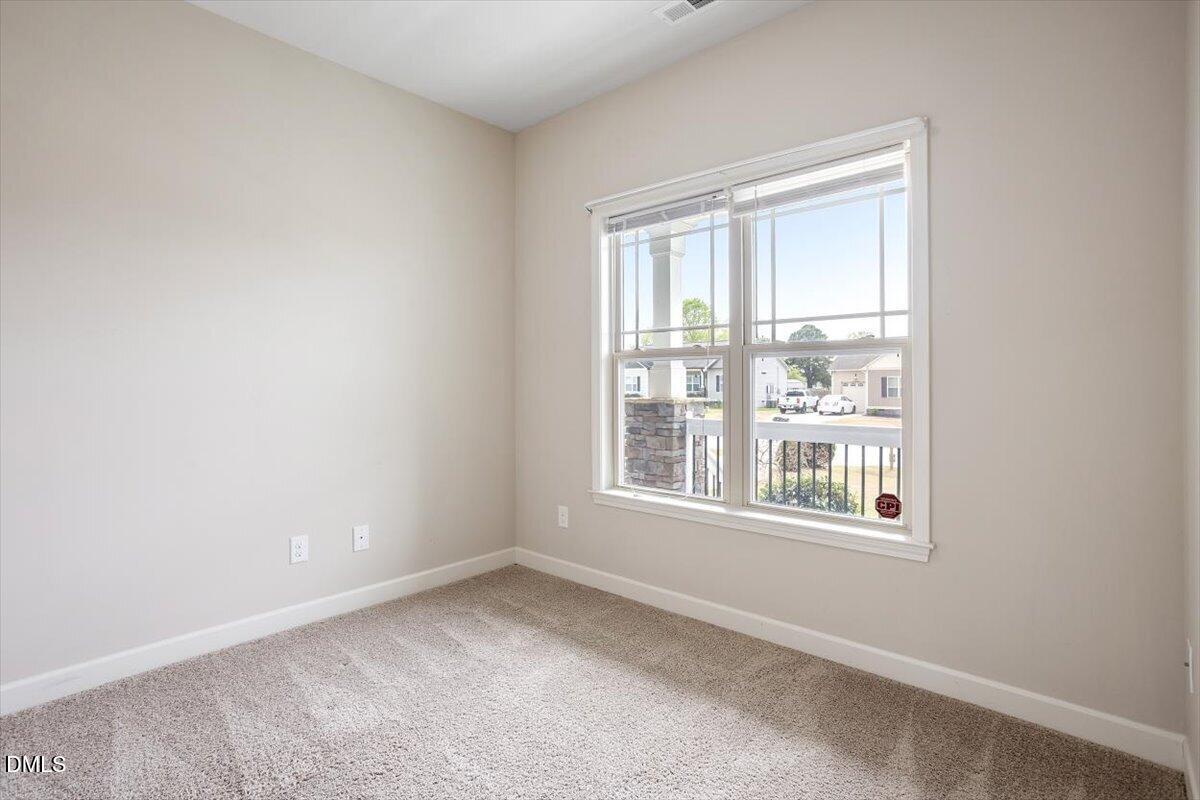 35 Fox Run Court Benson, NC 27504 - Photo 27 of 54 an empty room with a window