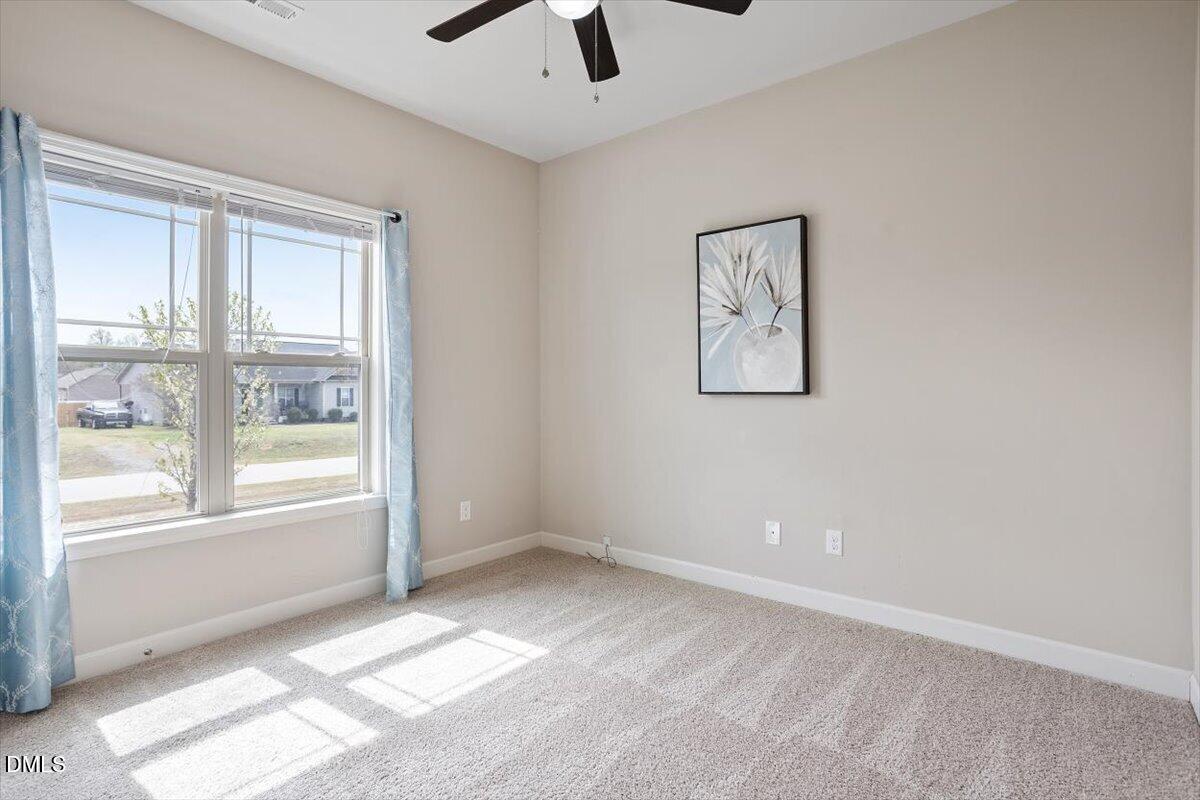 35 Fox Run Court Benson, NC 27504 - Photo 28 of 54 a view of an empty room with a window