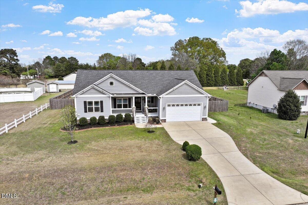 35 Fox Run Court Benson, NC 27504 - Photo 34 of 54 a front view of a house with garden