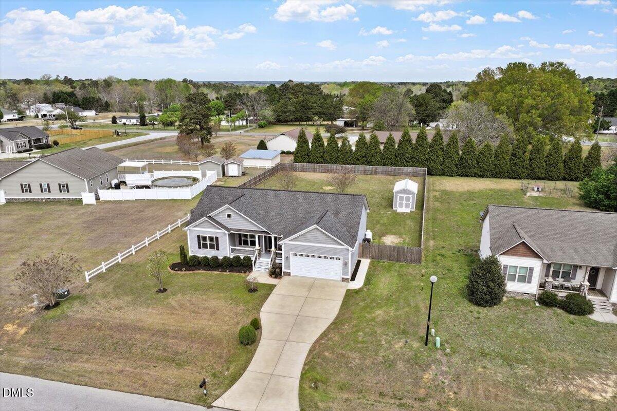 35 Fox Run Court Benson, NC 27504 - Photo 38 of 54 an aerial view of a house with garden space and houses