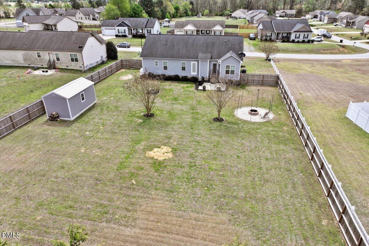 35 Fox Run Court Benson, NC 27504 - Photo 51 of 54 an aerial view of a house with a swimming pool