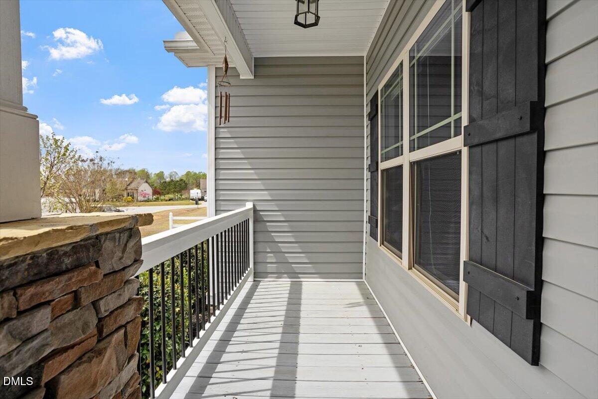 35 Fox Run Court Benson, NC 27504 - Photo 6 of 54 a view of a balcony with wooden floor