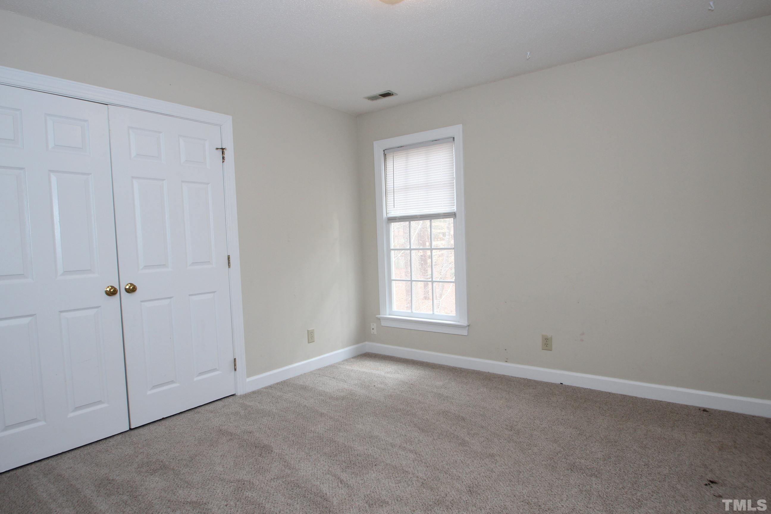 4013 Country Village Drive Raleigh, NC 27606 - Photo 15 of 23 an empty room with windows