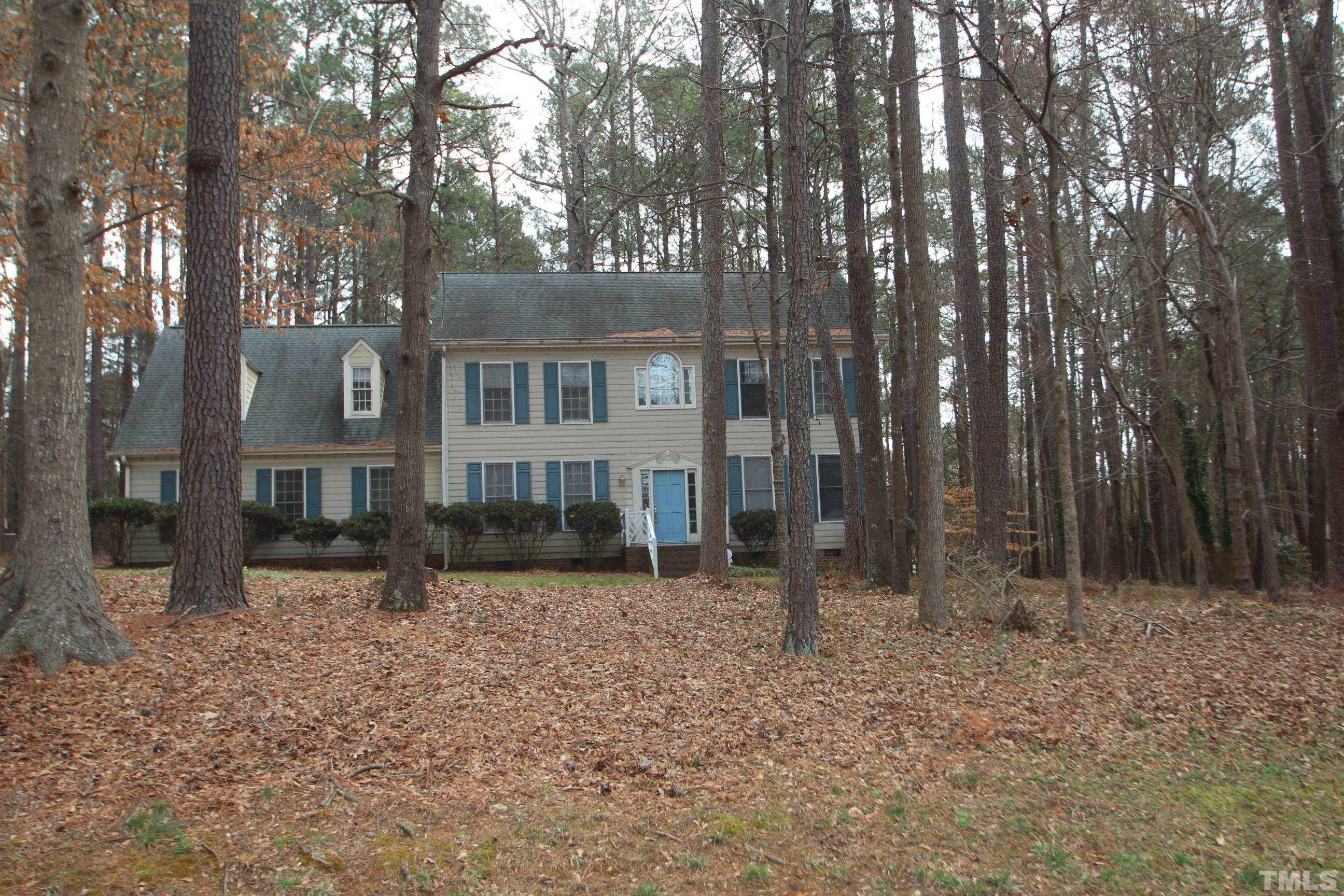 4013 Country Village Drive Raleigh, NC 27606 - Photo 23 of 23 front view of a house with a yard