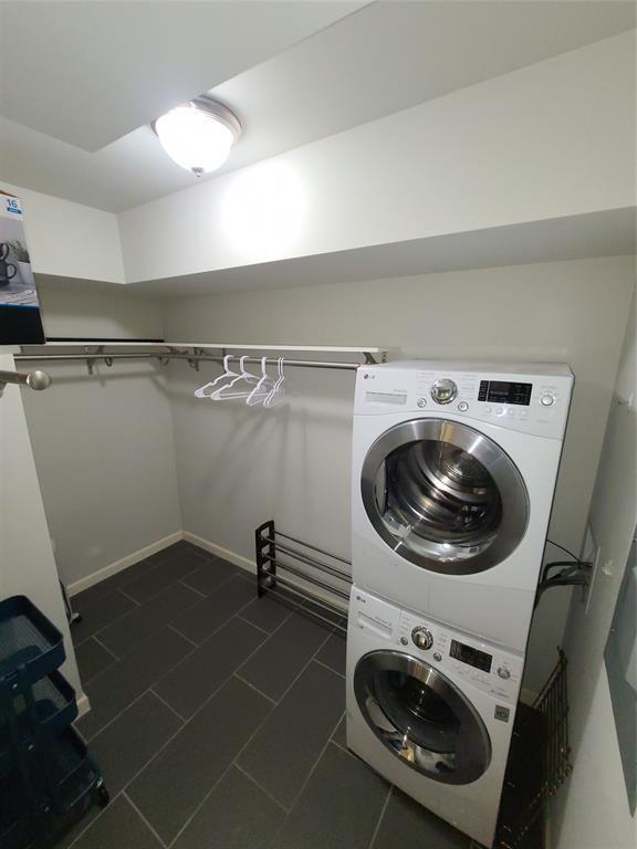 3110 Red River Street, Unit 307 Austin, TX 78705 - Photo 4 of 5 a utility room with dryer and washer