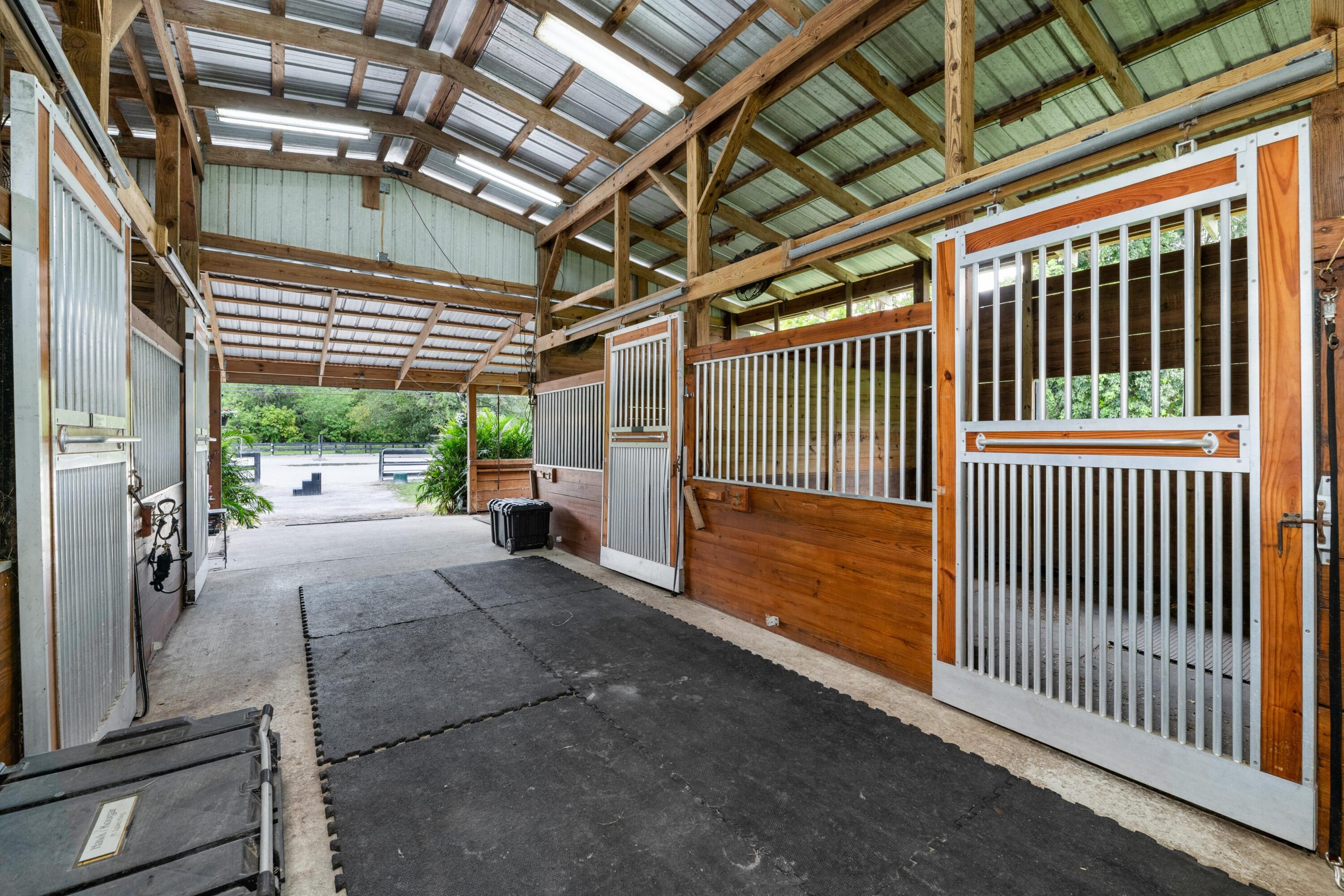 14536 N Road Loxahatchee Groves, FL 33470 - Photo 14 of 79 Center Aisle 7 Stall Barn