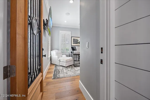 a bedroom with a bed lamps and window