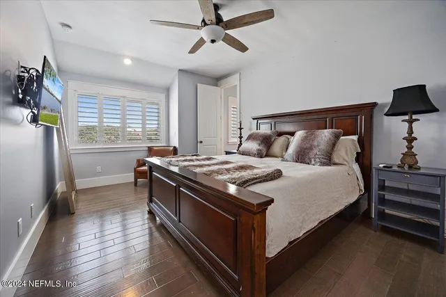 a bed room with a bed and a couch