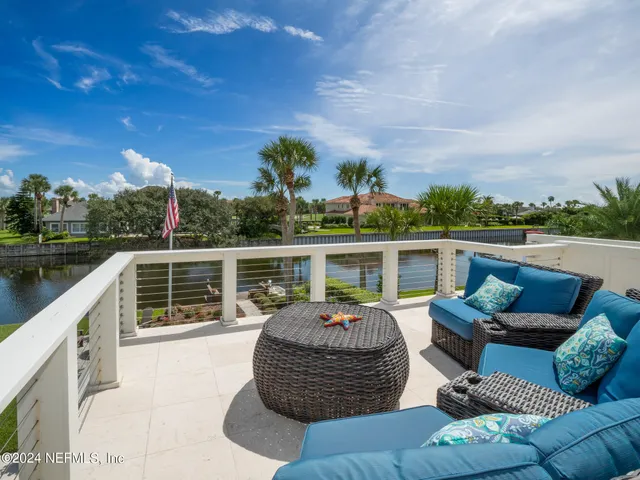 a view of a lake with a big yard