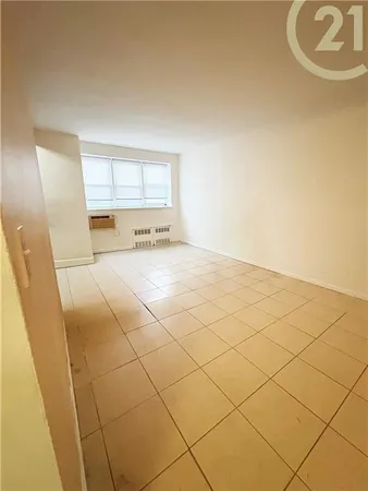 a view of a livingroom with a sink and a mirror