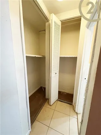 a bathroom with a glass door shower and a sink