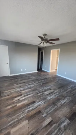 a view of a livingroom with a ceiling fan