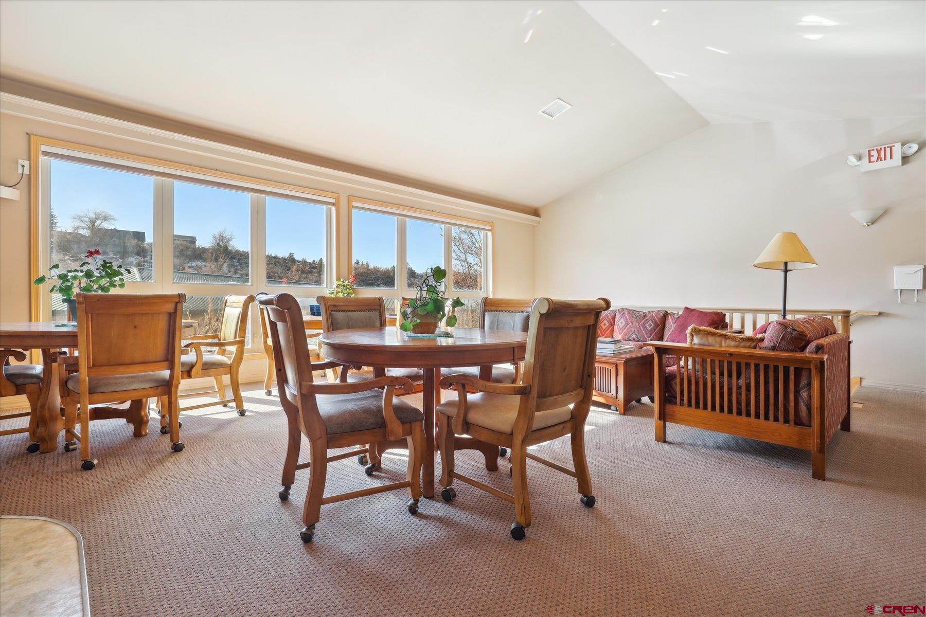 35 Sunshine Court, Unit 3 Durango, CO 81301 - Photo 17 of 26 a view of a dining room with furniture window and outside view