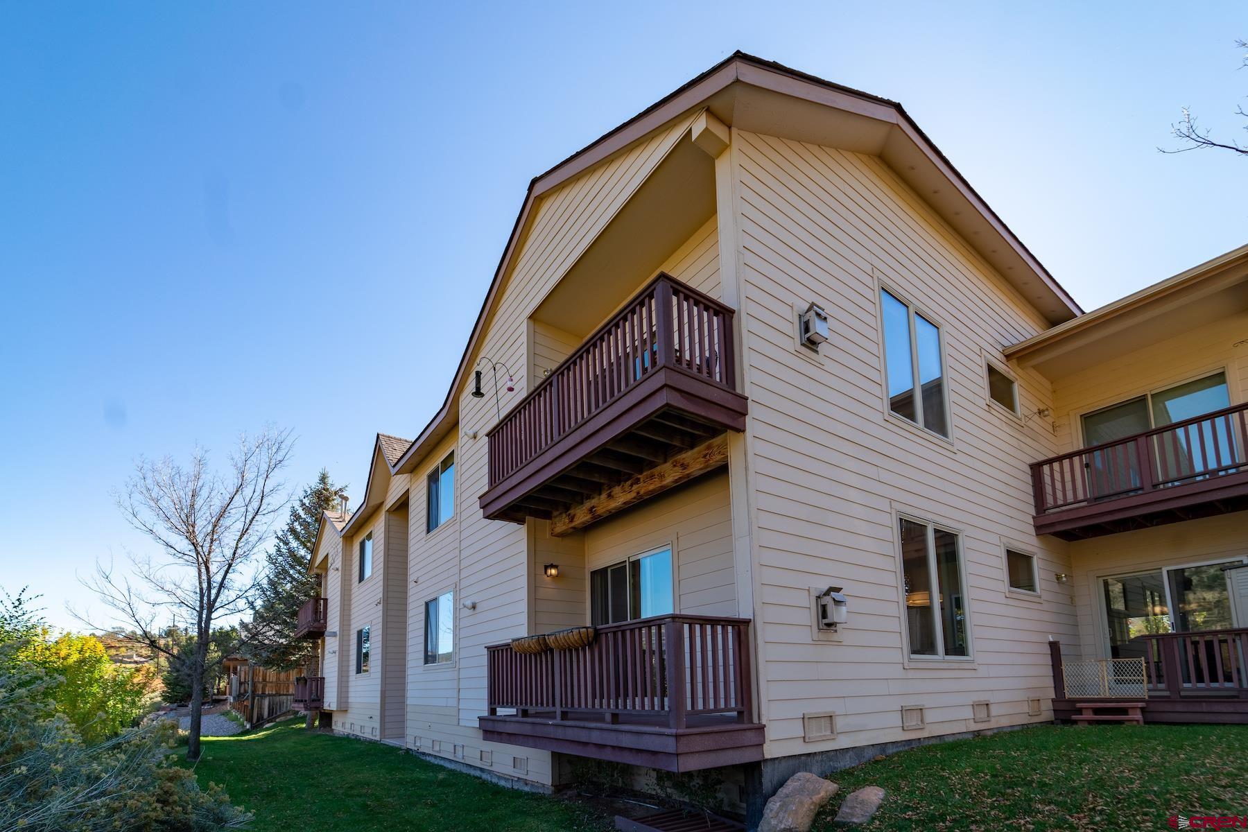 35 Sunshine Court, Unit 3 Durango, CO 81301 - Photo 20 of 26 a view of house with a yard