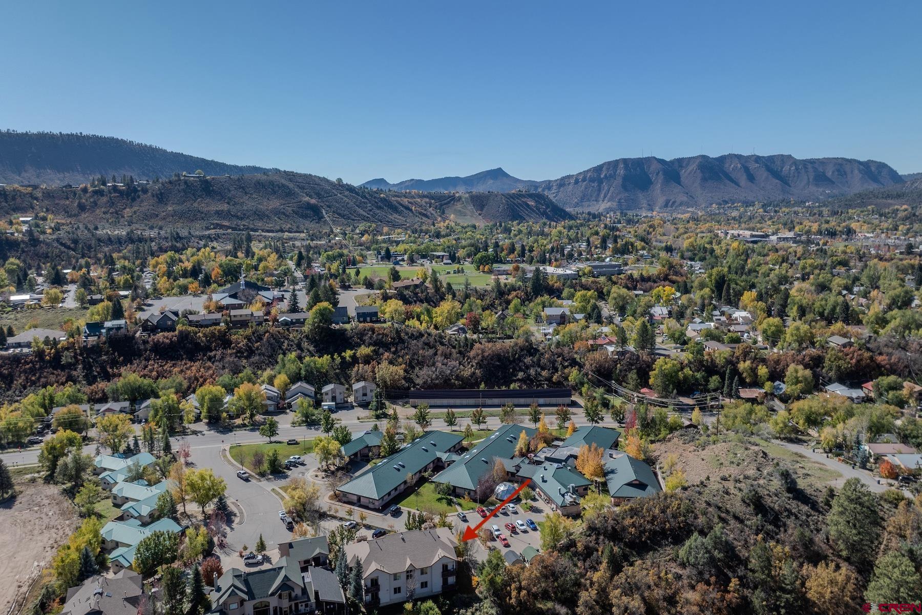35 Sunshine Court, Unit 3 Durango, CO 81301 - Photo 22 of 26 an aerial view of residential house and sandy dunes