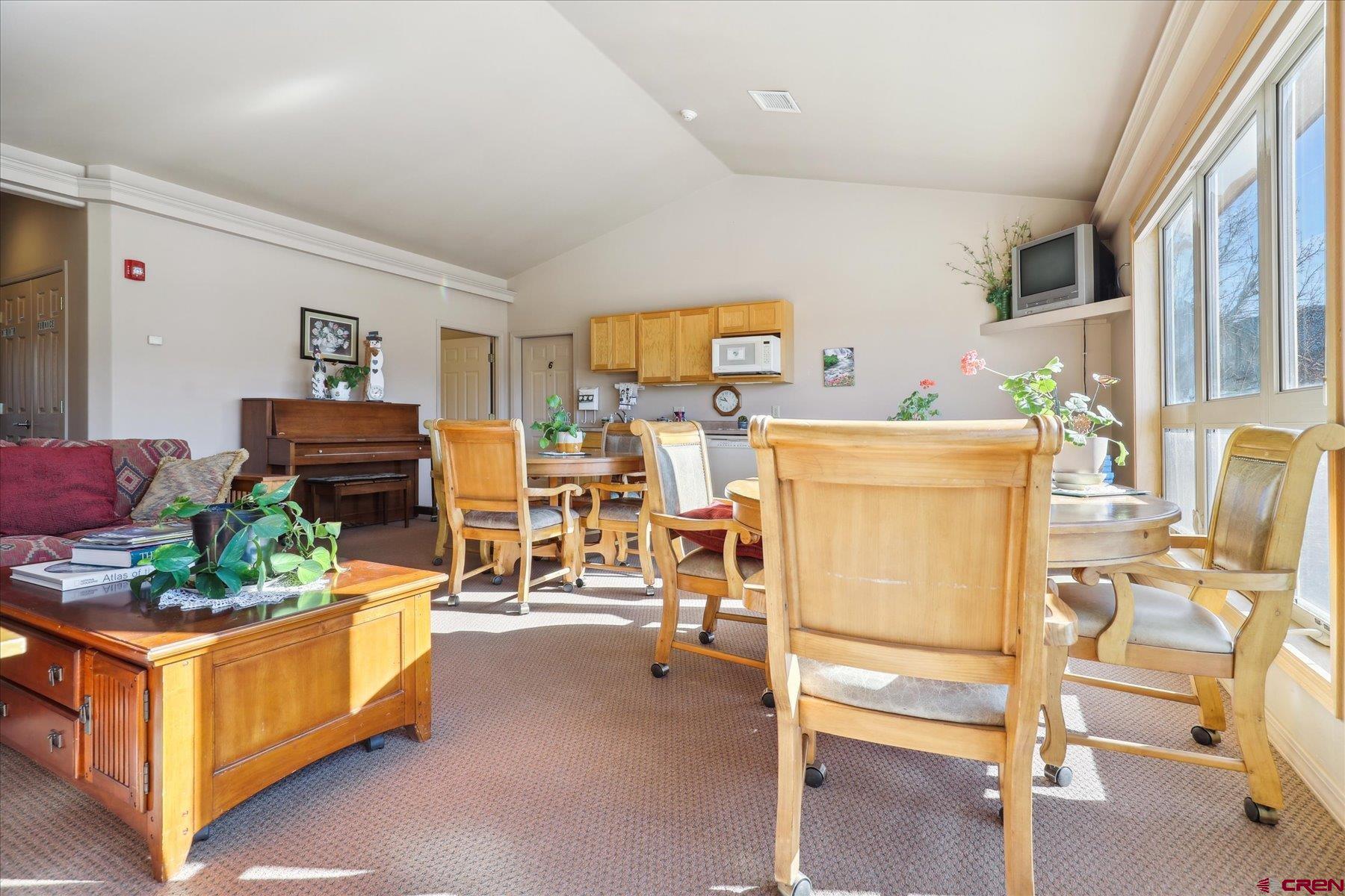 35 Sunshine Court, Unit 3 Durango, CO 81301 - Photo 10 of 26 a living room with furniture and a fireplace