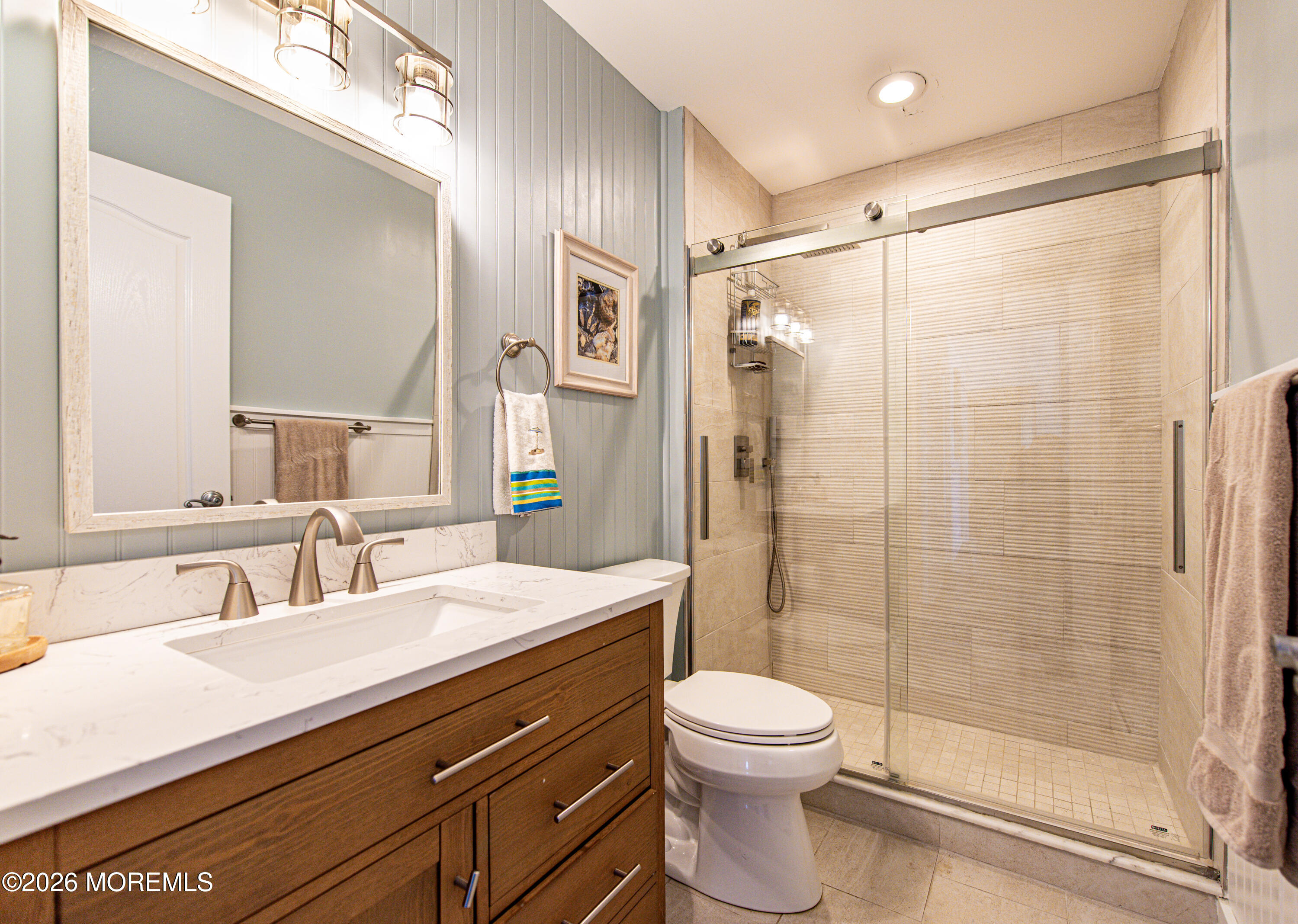 5 A Sunset Boulevard Barnegat Light, NJ 08006 - Photo 32 of 65 a bathroom with a sink a toilet and shower