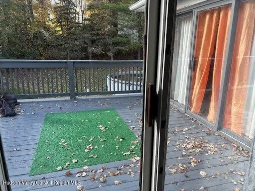 a view of a porch with a yard