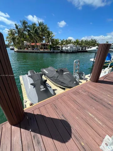 a view of a balcony with lake view and mountain view