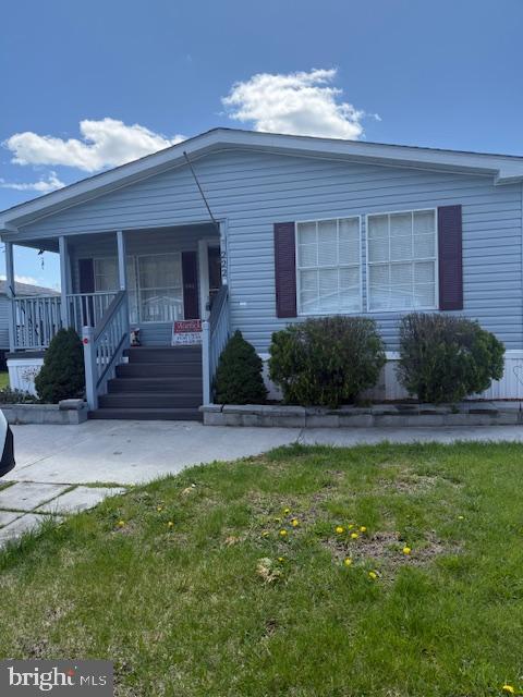 222 Poclain Road Aberdeen, MD 21001 - Photo 1 of 19 a view of a house with a yard and furniture