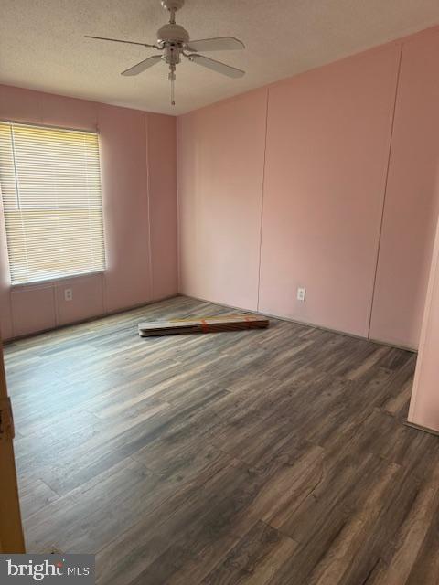 222 Poclain Road Aberdeen, MD 21001 - Photo 13 of 19 an empty room with wooden floor and windows