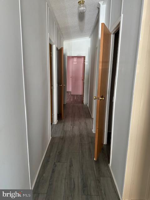 222 Poclain Road Aberdeen, MD 21001 - Photo 16 of 19 a view of a hallway with wooden floor