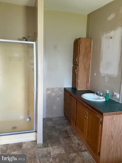 222 Poclain Road Aberdeen, MD 21001 - Photo 17 of 19 a bathroom with a granite countertop sink and a mirror