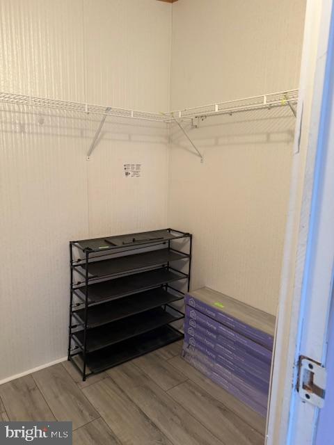 222 Poclain Road Aberdeen, MD 21001 - Photo 19 of 19 a view of walk in closet with empty racks