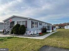 222 Poclain Road Aberdeen, MD 21001 - Photo 6 of 19 a view of a house with a yard