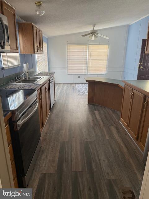 222 Poclain Road Aberdeen, MD 21001 - Photo 8 of 19 a kitchen with wooden floors and a sink
