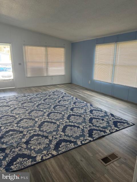 222 Poclain Road Aberdeen, MD 21001 - Photo 10 of 19 a view of a room with wooden floor and window