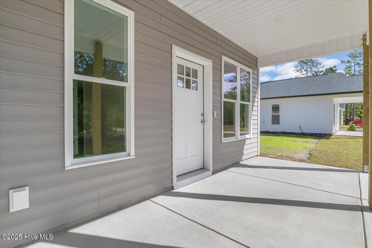 1049 Greenview Road Southport, NC 28461 - Photo 4 of 31 32-Final 1049 Greenview Rd Southport-RJR