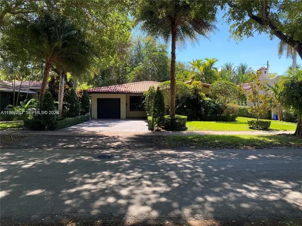 a view of a house with a swimming pool